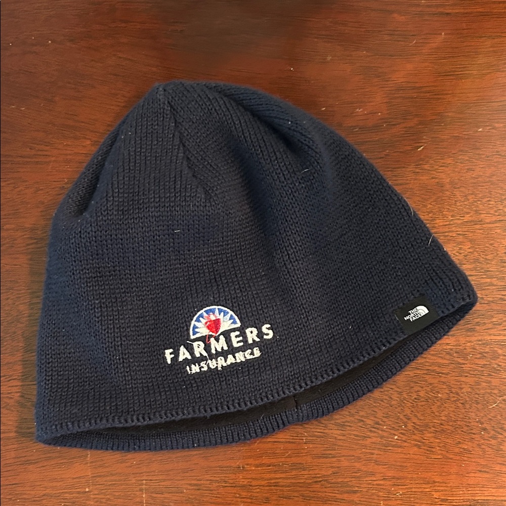 E49 The North Face Navy Knit Beanie Farmers Insurance NWOT